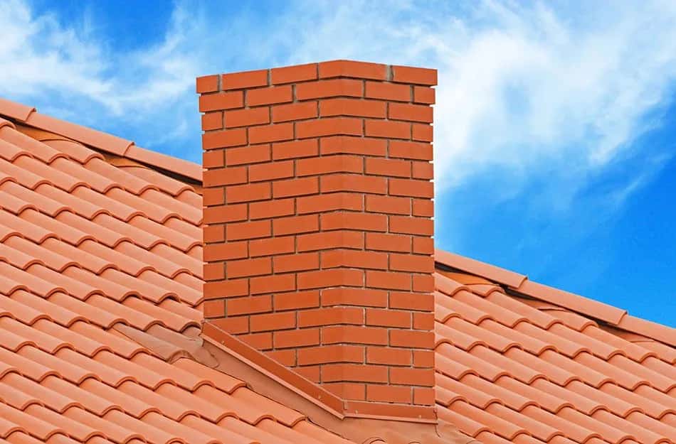 Czym obłożyć komin na dachu? Najlepsze materiały i porady